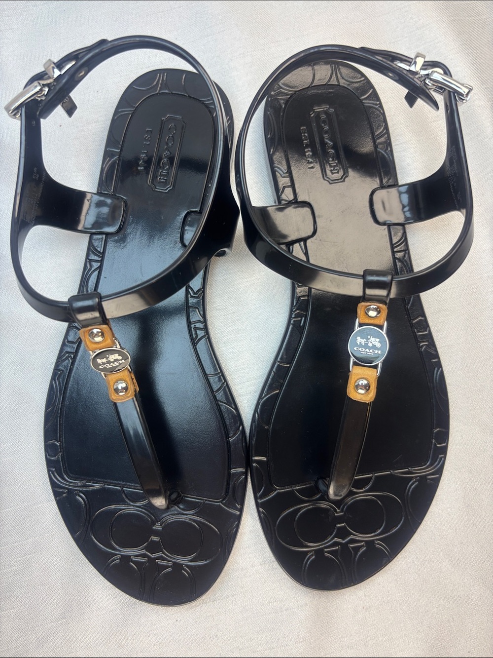Coach Black Jelly T-Strap Sandals with Tan Logo Accents